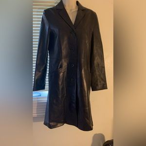 Ladies lambskin leather trench coat.  It is black and size small.  Cole Haan.